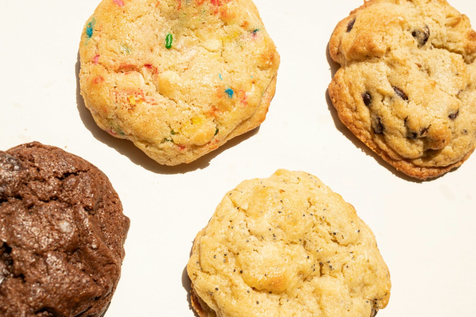 A close up of four cookies on a plate